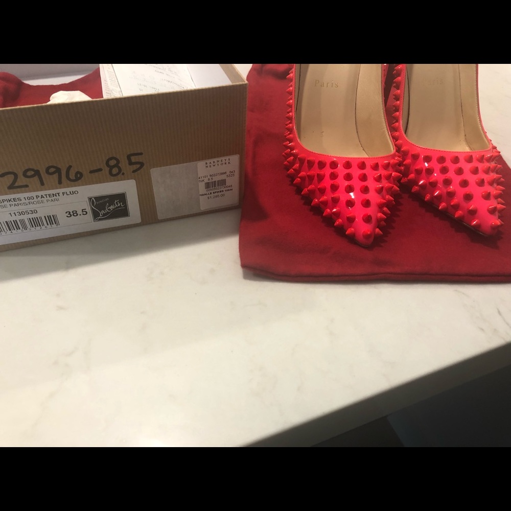Christian Louboutin pumps.